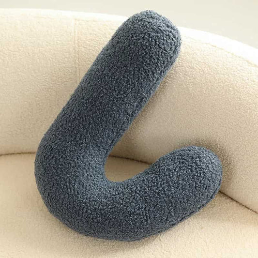 Coussin en forme de J