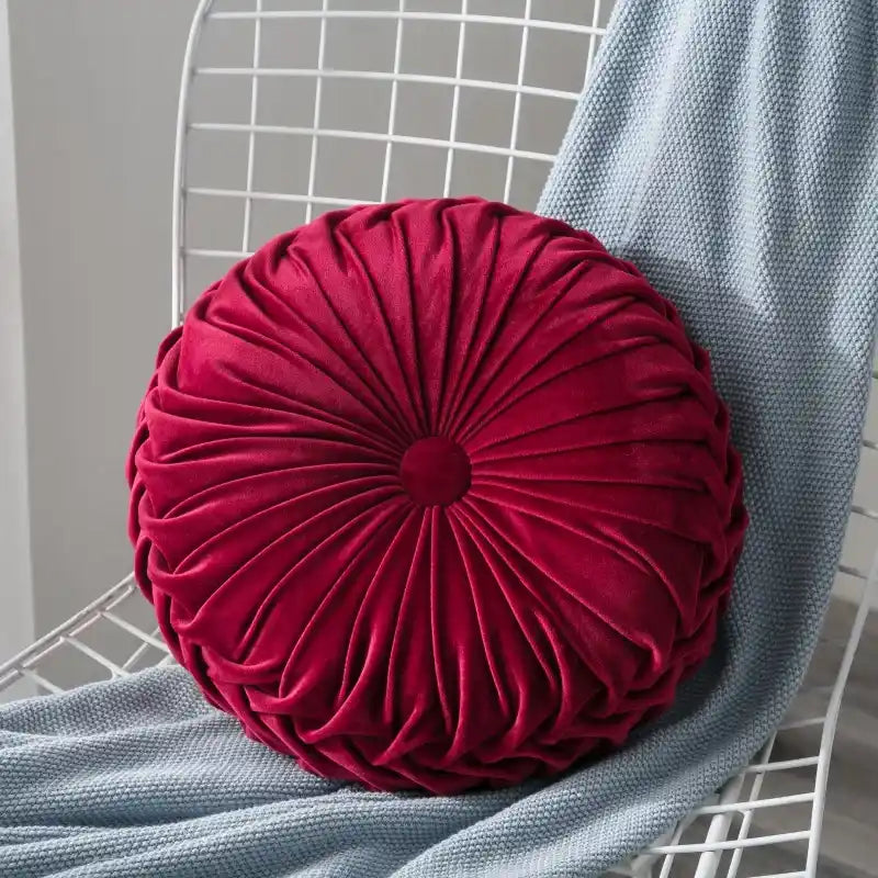 Coussin rouge design velours tissu rond