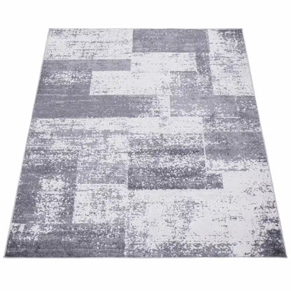 Tapis Design Carva Gris sur fond blanc