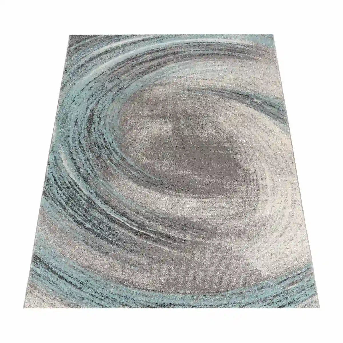 Tapis Design Vertigo Turquoise sur fond blanc