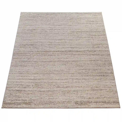 Tapis Uni Luby Cream sur fond blanc