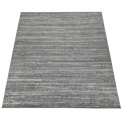 Tapis Uni Luby Gris sur fond blanc
